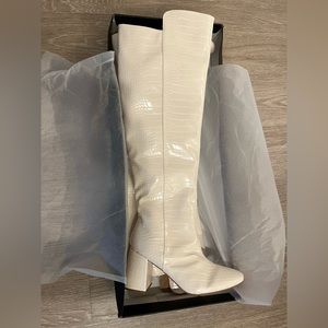 Over the knee flared heel boots